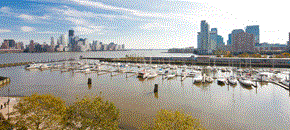 Jersey City apartment for rent - a harbor with boats and a city in the background